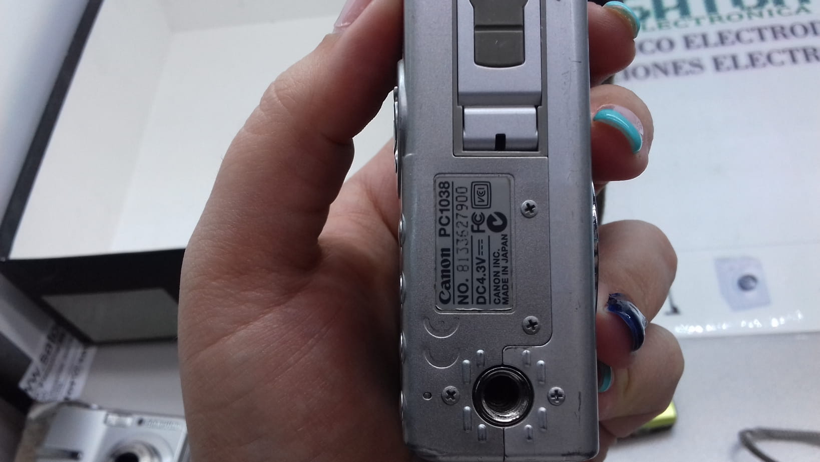 Canon Ixus400 Pc1038 etiqueta