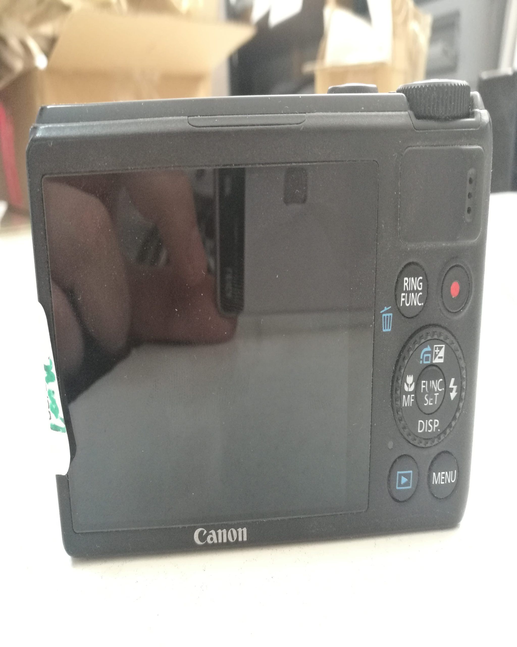 camara canon power shot S100 trasera